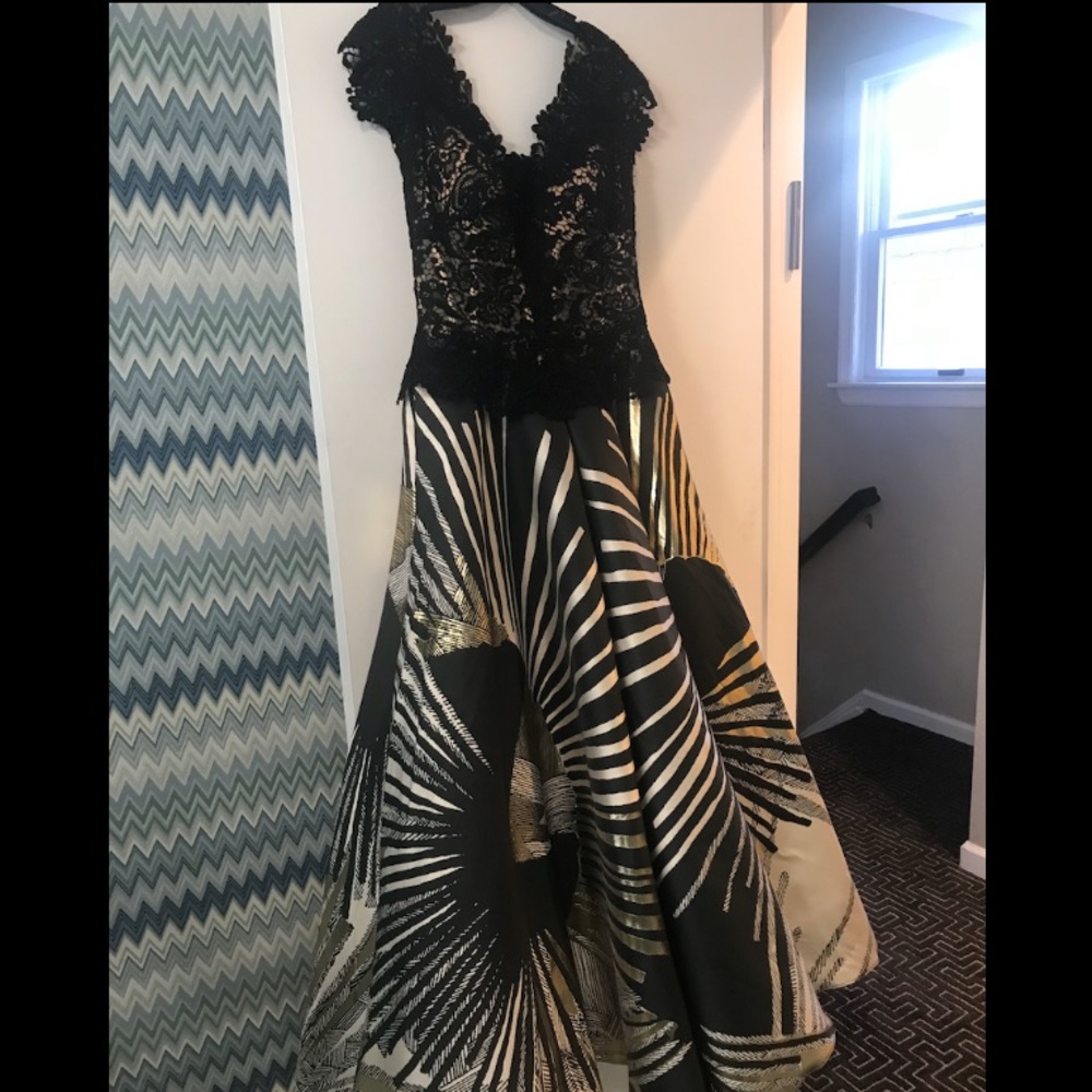 Black and gold off the shoulder gown